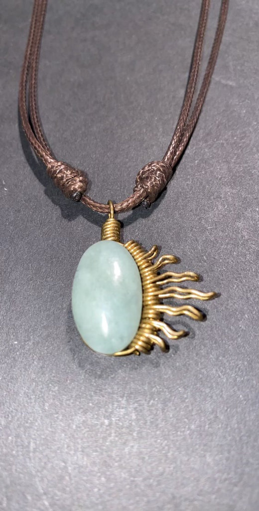 Handmade jade wire wrapped necklace.